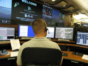 A 911 dispatcher in Arlington's Emergency Communications Center