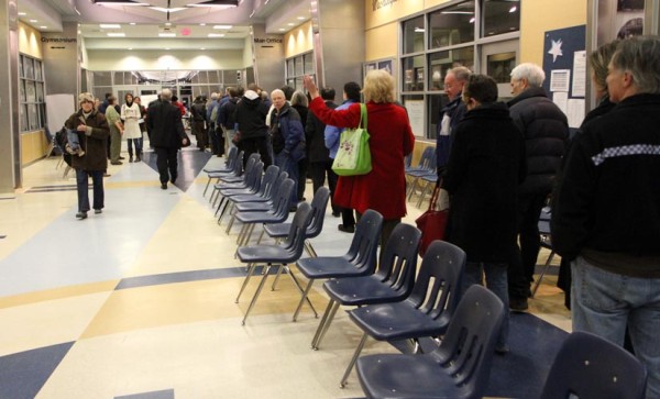 Voters line up at the Democratic caucus at Washington-Lee High School (Jan. 2012)