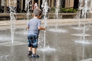 Child cooling off at fountains in Ballston (photo by Maryva2)