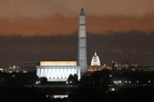 Night view of the Lincoln Memorial, Washington Monument and Capitol from Arlington