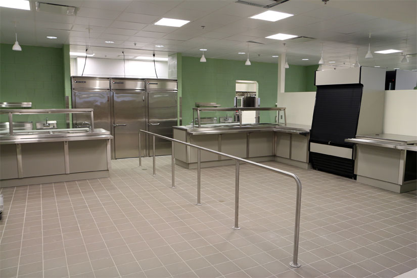 Wakefield High School's cafeteria, with a cook-in kitchen
