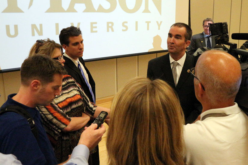 Ralph Northam takes questions from reporters