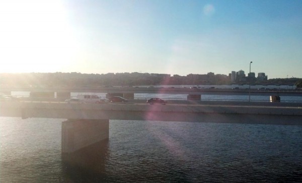 Sunset over Rosslyn and the Potomac River, as seen from a Yellow Line Metro train