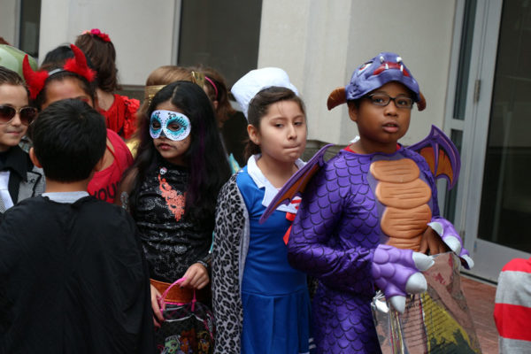 Elementary schoolers trick-or-treat in Courthouse