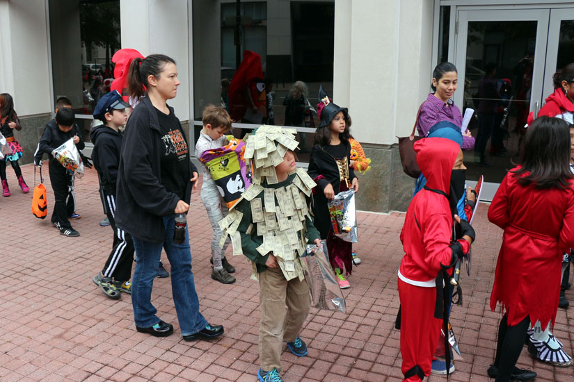Elementary schoolers trick-or-treat in Courthouse