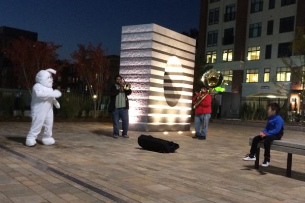 An impromptu tuba and trombone concert at Penrose Square Wednesday night
