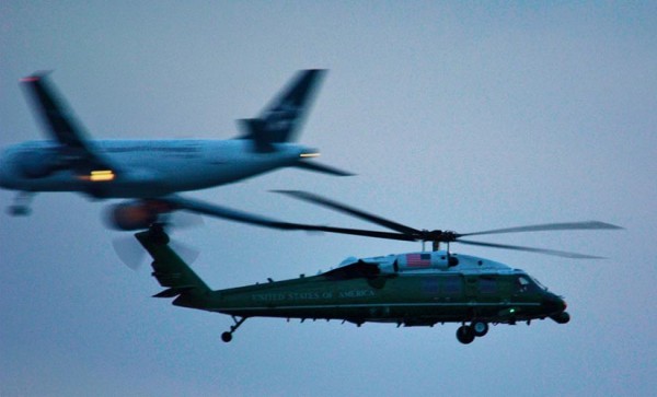 A VH-60 helicopter and passenger jet landing at DCA photographed in flight (Flickr pool photo by J. Sonder)