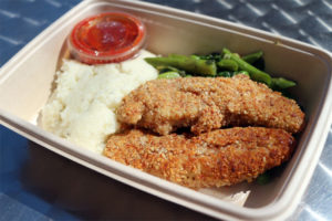 Almond-crusted chicken tenders and cauliflower mash from the Green Spoon