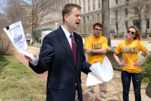 Del. Patrick Hope (D) calls for higher taxes on the wealthy in front of the D.C. IRS headquarters