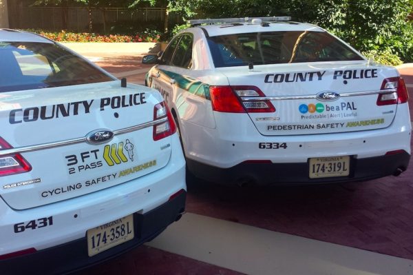 New decals on police cars remind drivers, pedestrians and cyclists to be Predictable, Alert, Lawful, or PAL (photo via Arlington County)