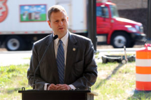 Del. Patrick Hope speaks at a ribbon-cutting for the new Route 50/N. Courthouse Road interchange