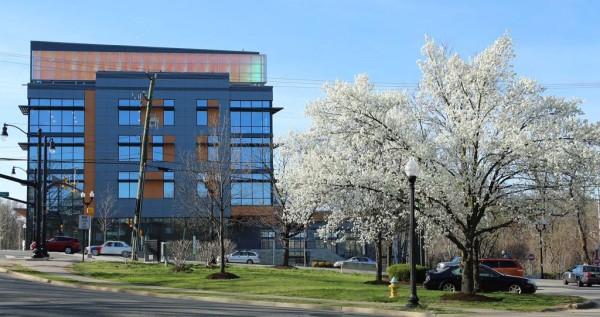 Arlington Mill Community Center on Columbia Pike in the spring (photo courtesy @TheBeltWalk)