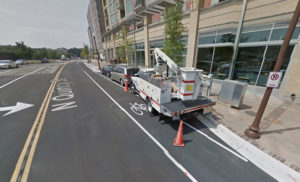 Commercial vehicle parked in the bike lane on Quincy Street (image via Google Maps)