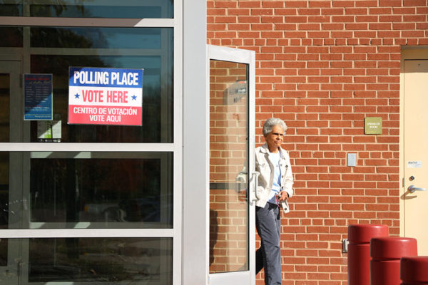 A woman walks out of the Walter Reed Recreation Center after voting (file photo)