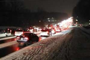 Very heavy traffic during a snowy evening commute on Jan. 20, 2016