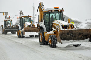 Front end loaders clearing snow during the January 2016 blizzard (Flickr pool photo by Starbuck77)